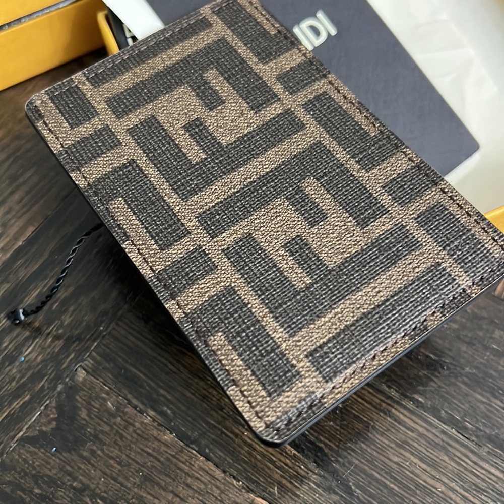 Brand new Authentic FENDI FF black and brown card holder
